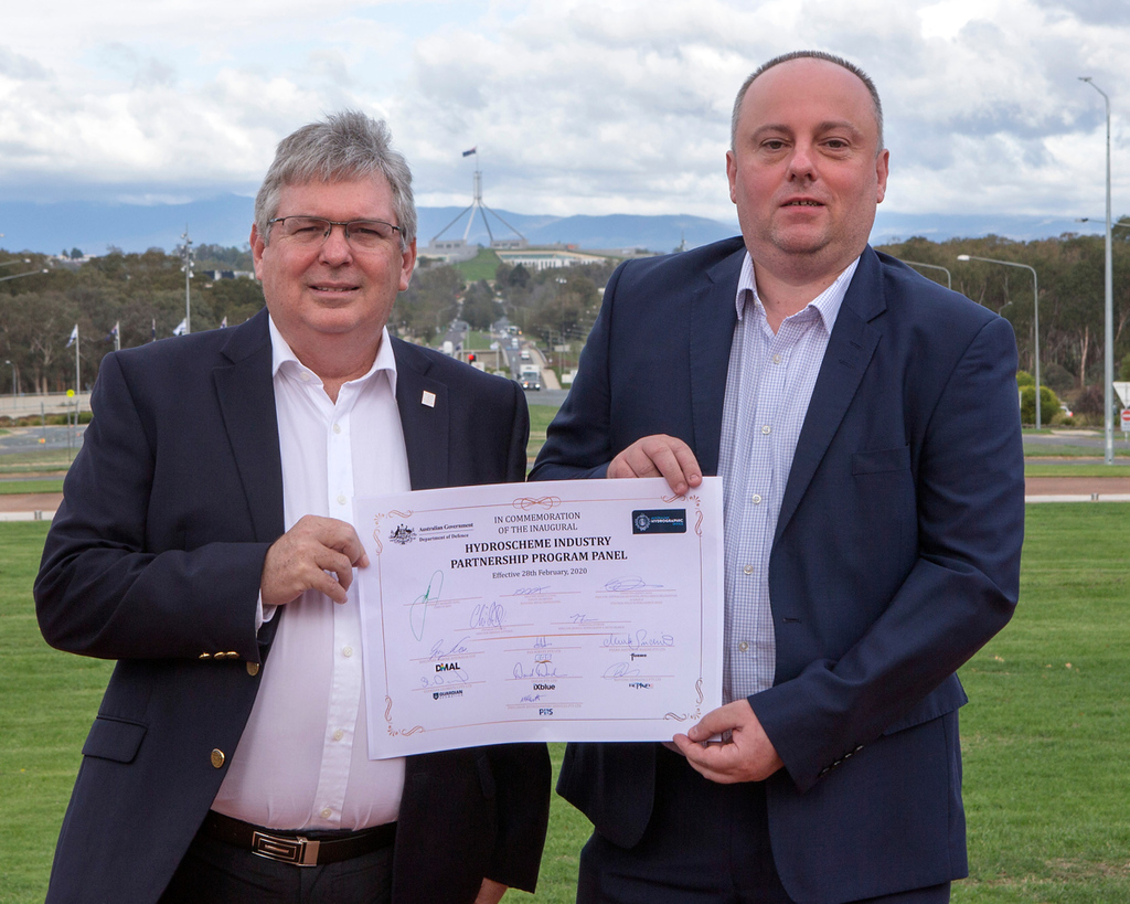 Guardian Geomatics representatives with the Hydroscheme Industry Partnership Program Commemoration Certificate during a Ceremony held at Russell Offices, Canberra.